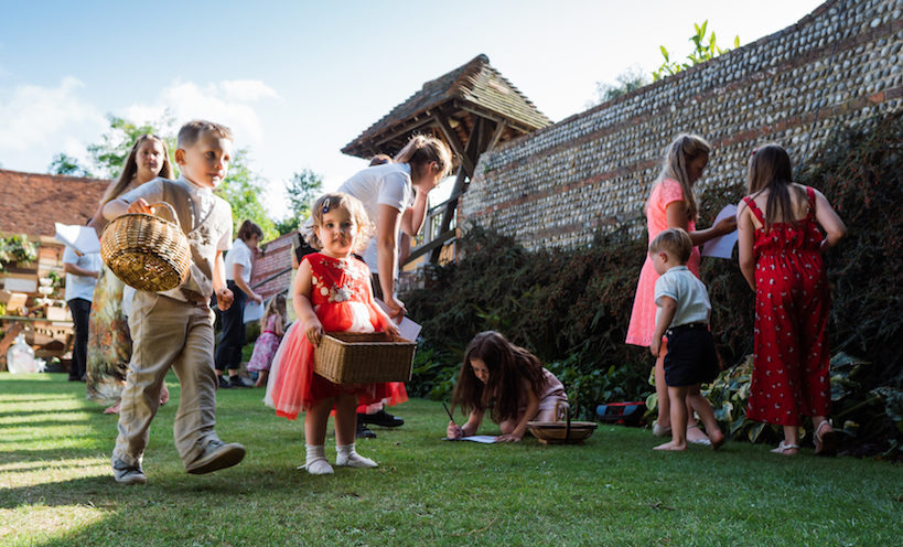 A group of children participating in an activity during a christening